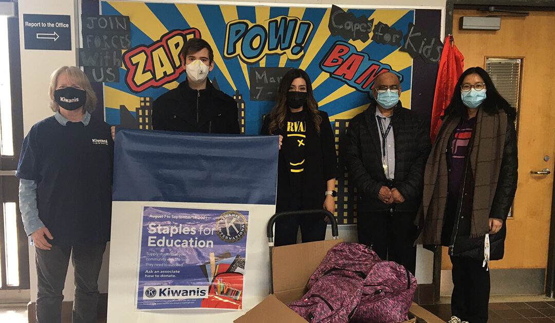 Delivering Back to School Supplies in Backpacks to Gateway Public School